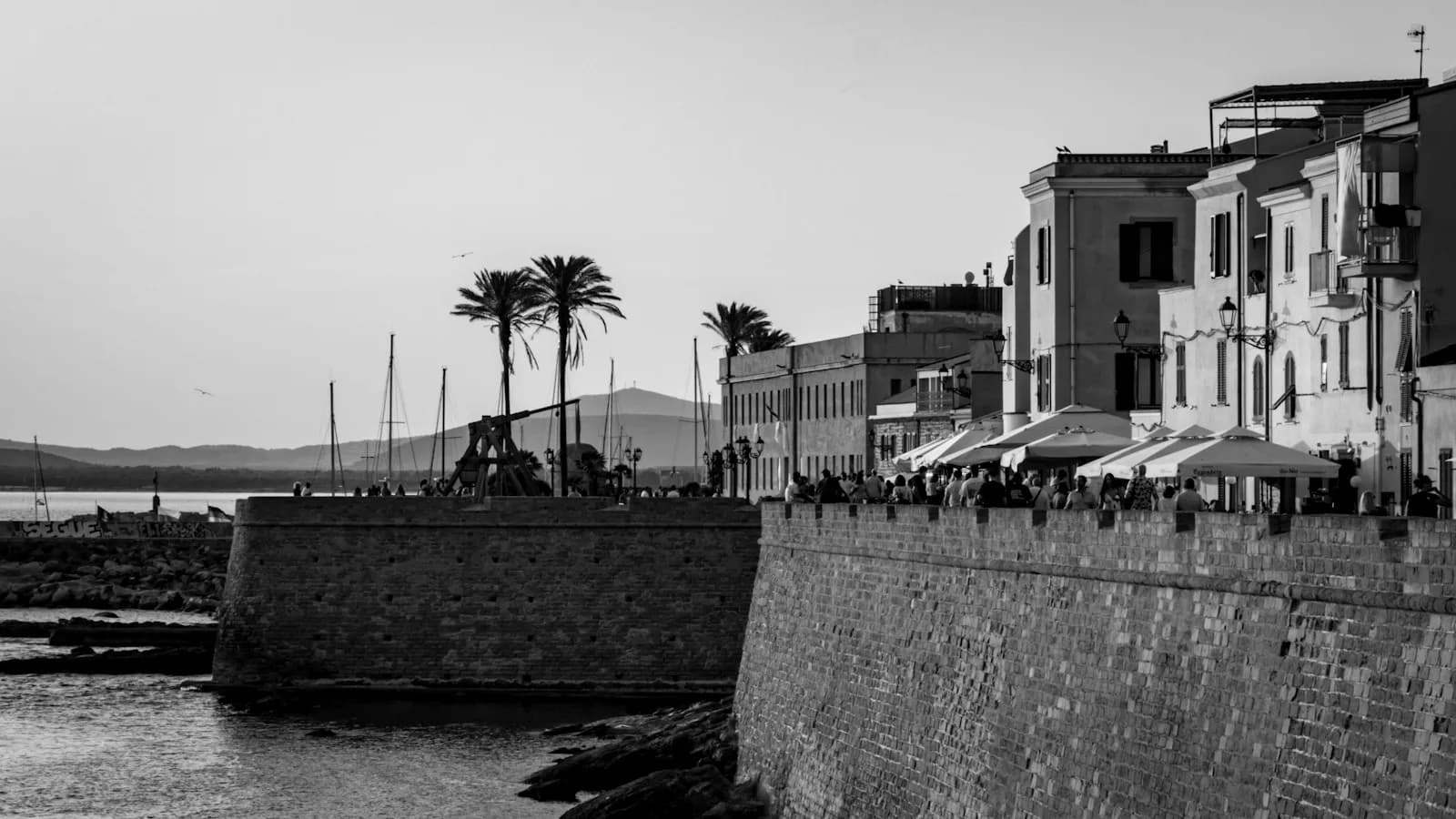 Old-town walls and seafront buildings in Alghero
