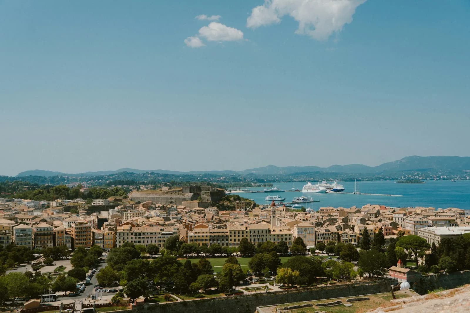 Pastel old-town streets and sea light on Corfu