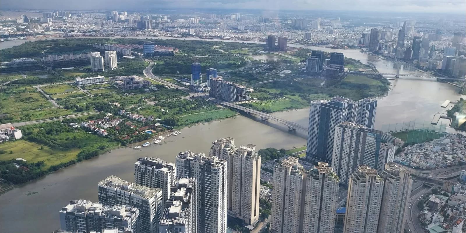Ho Chi Minh City skyline and river from above