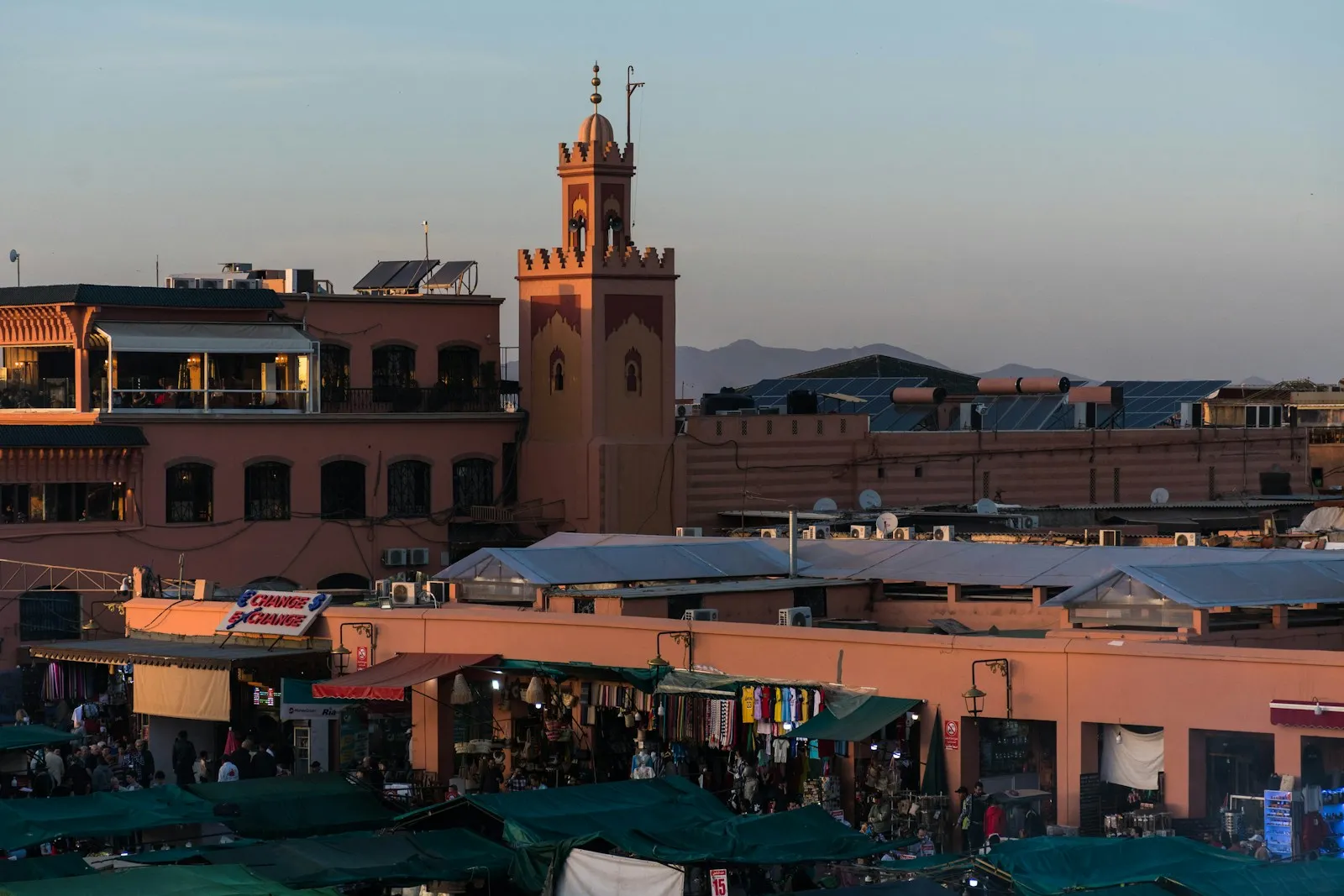 Jemaa el-Fna square and a landmark tower in Marrakech
