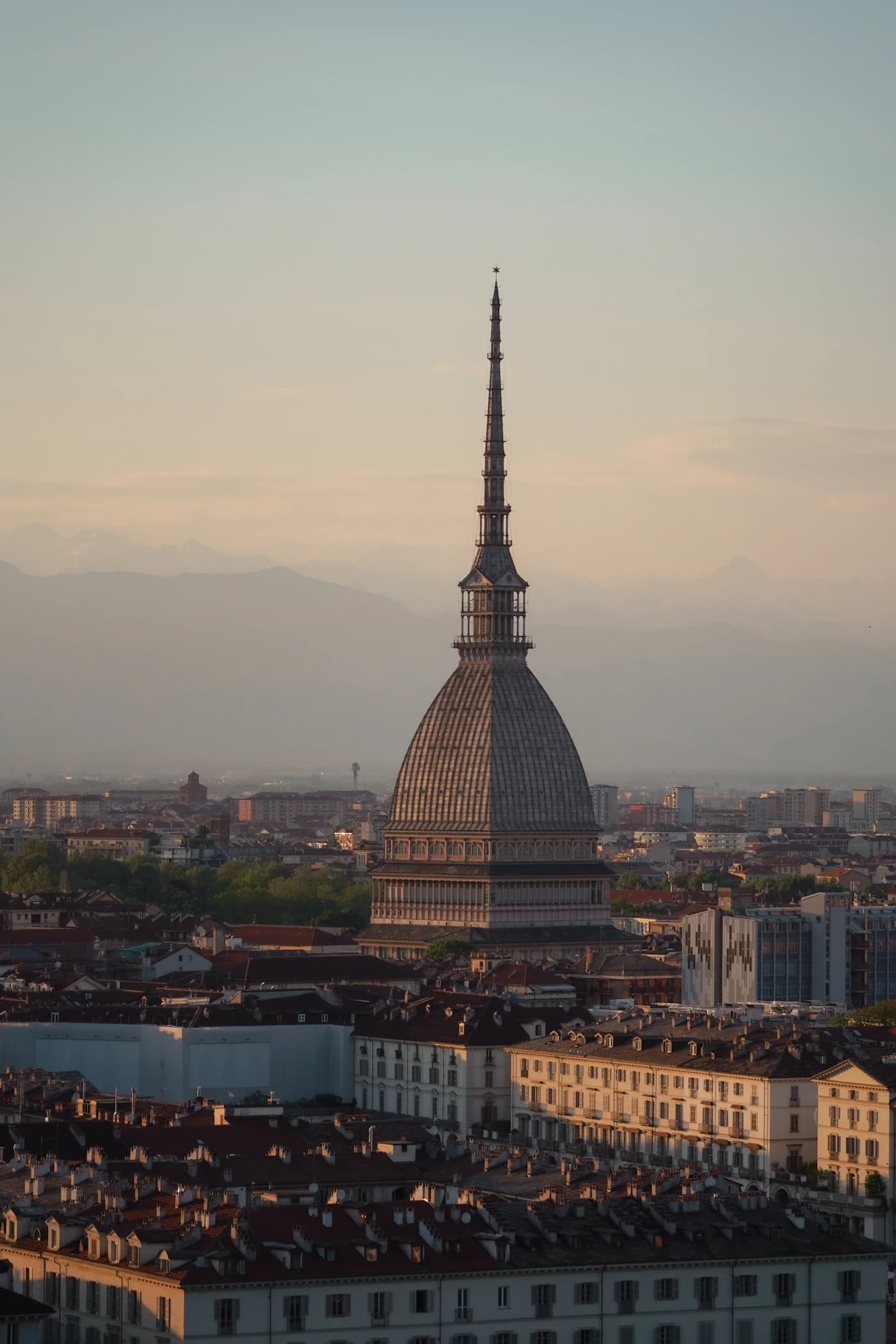 The Mole Antonelliana spire above Turin at sunset